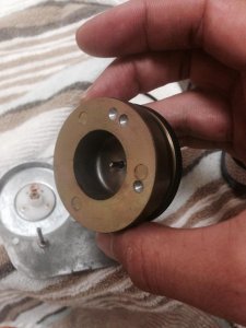 Flywheel fitting that is inserted to plate.jpg