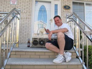 Jimmy on porch with 777.JPG